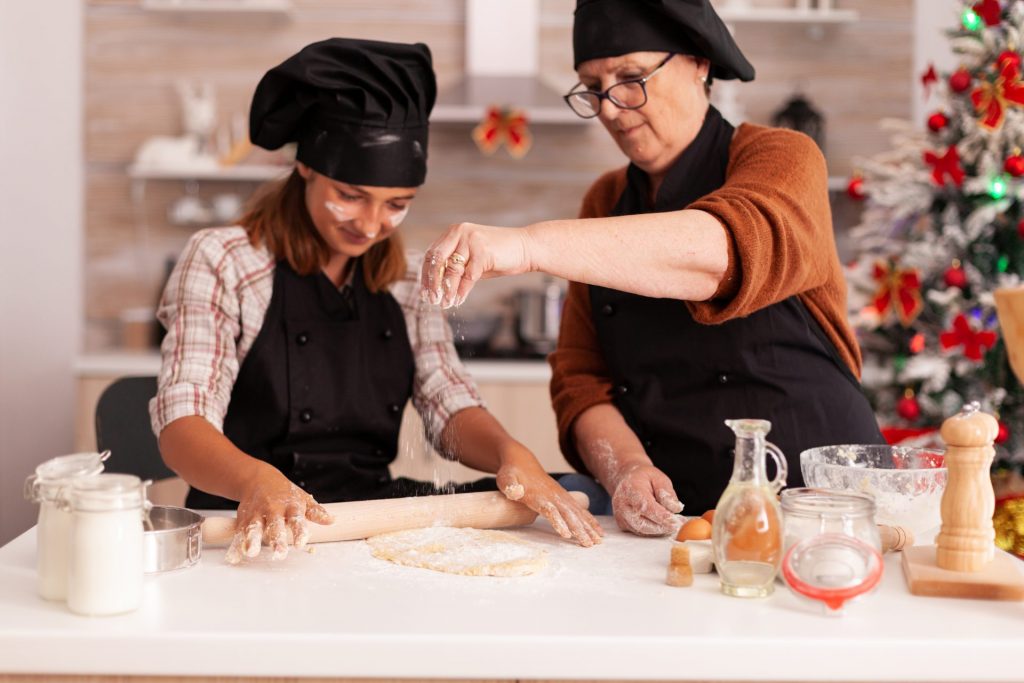 happy-family-with-apron-making-traditional-dough-cooking-xmas-gingerbread-dessert